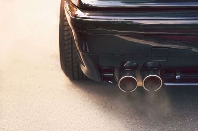 A visual of a dual exhaust system spewing smoke